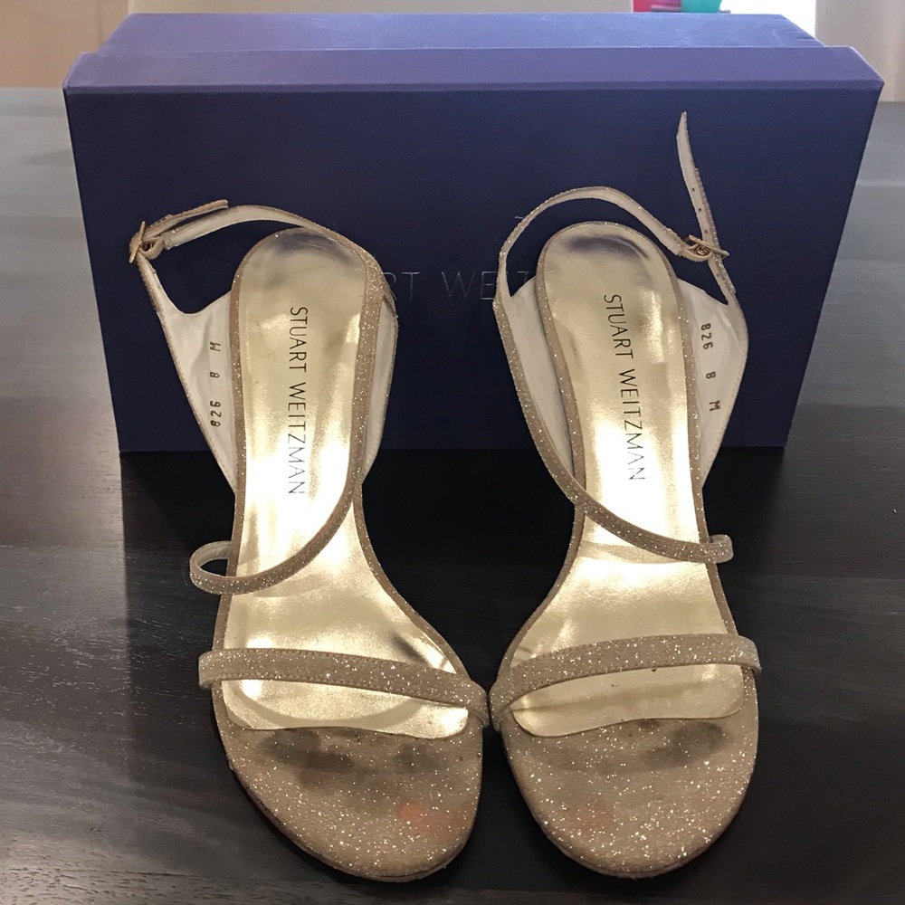 Beautiful gold strappy heal by Stuart Weitzman